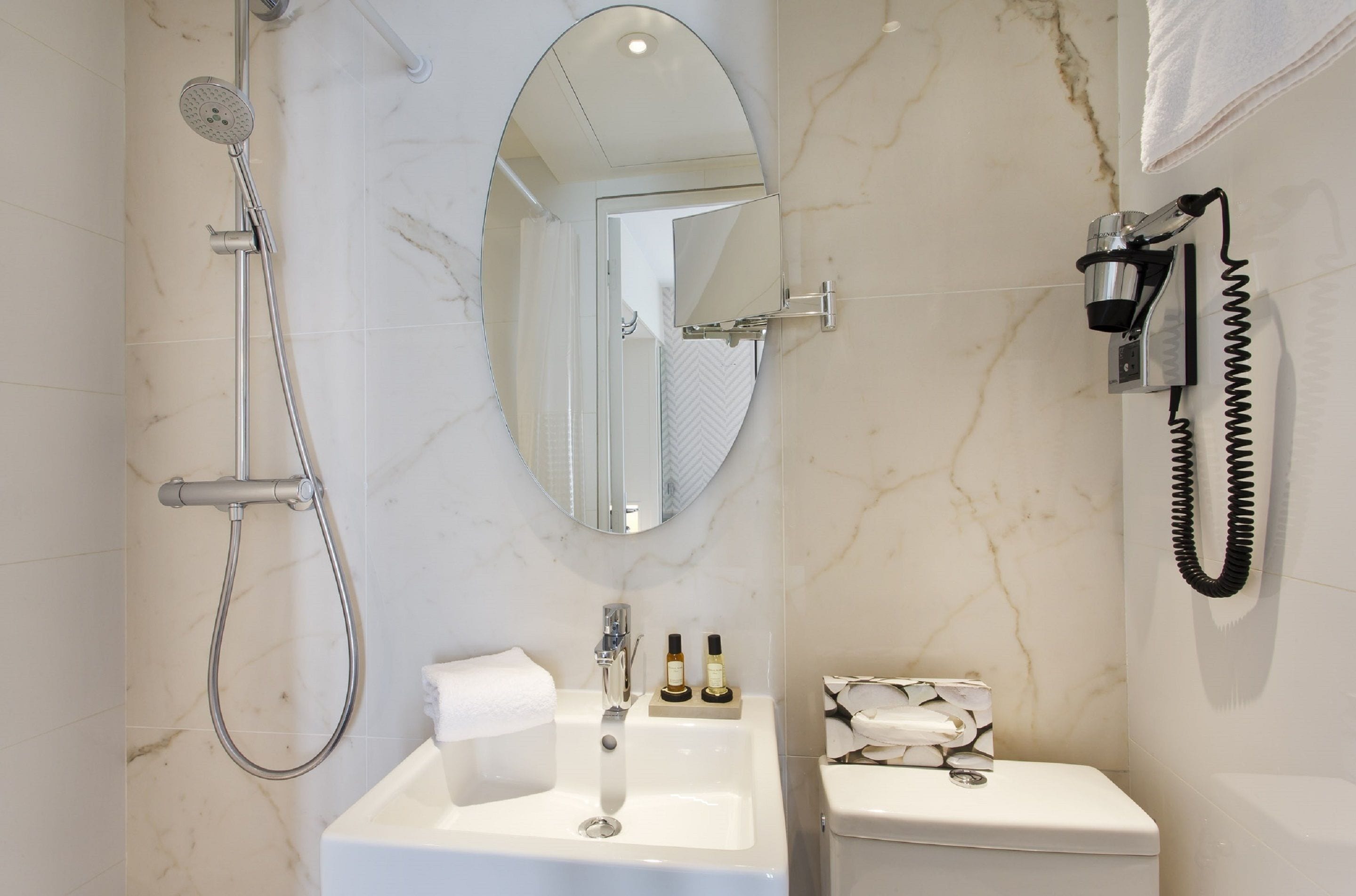 economy double room | bathroom | hair dryer, towels