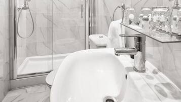 Shower, free toiletries, hair dryer, towels