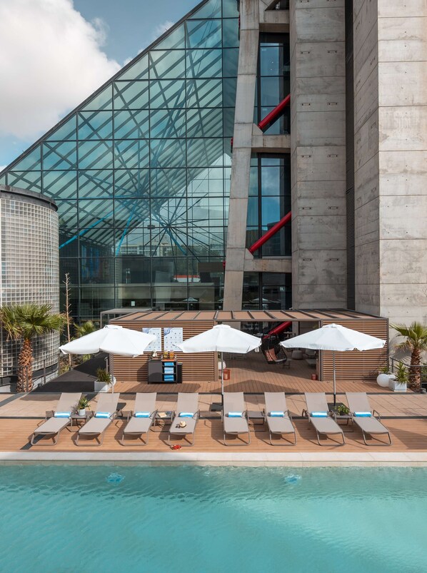 Seasonal outdoor pool, pool loungers