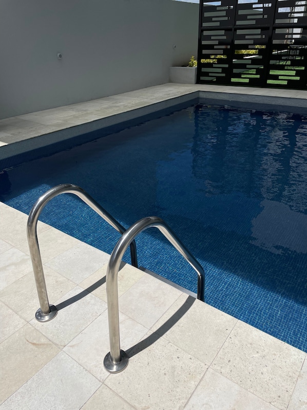 Outdoor pool, sun loungers