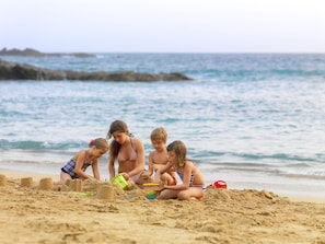 On the beach, free beach shuttle, sun loungers, beach umbrellas