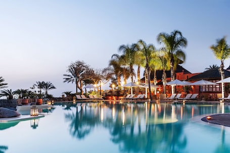 7 outdoor pools, pool umbrellas, sun loungers. The Ritz-Carlton Tenerife, Abama