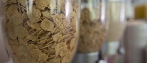 A close-up of a container filled with cereal flakes.