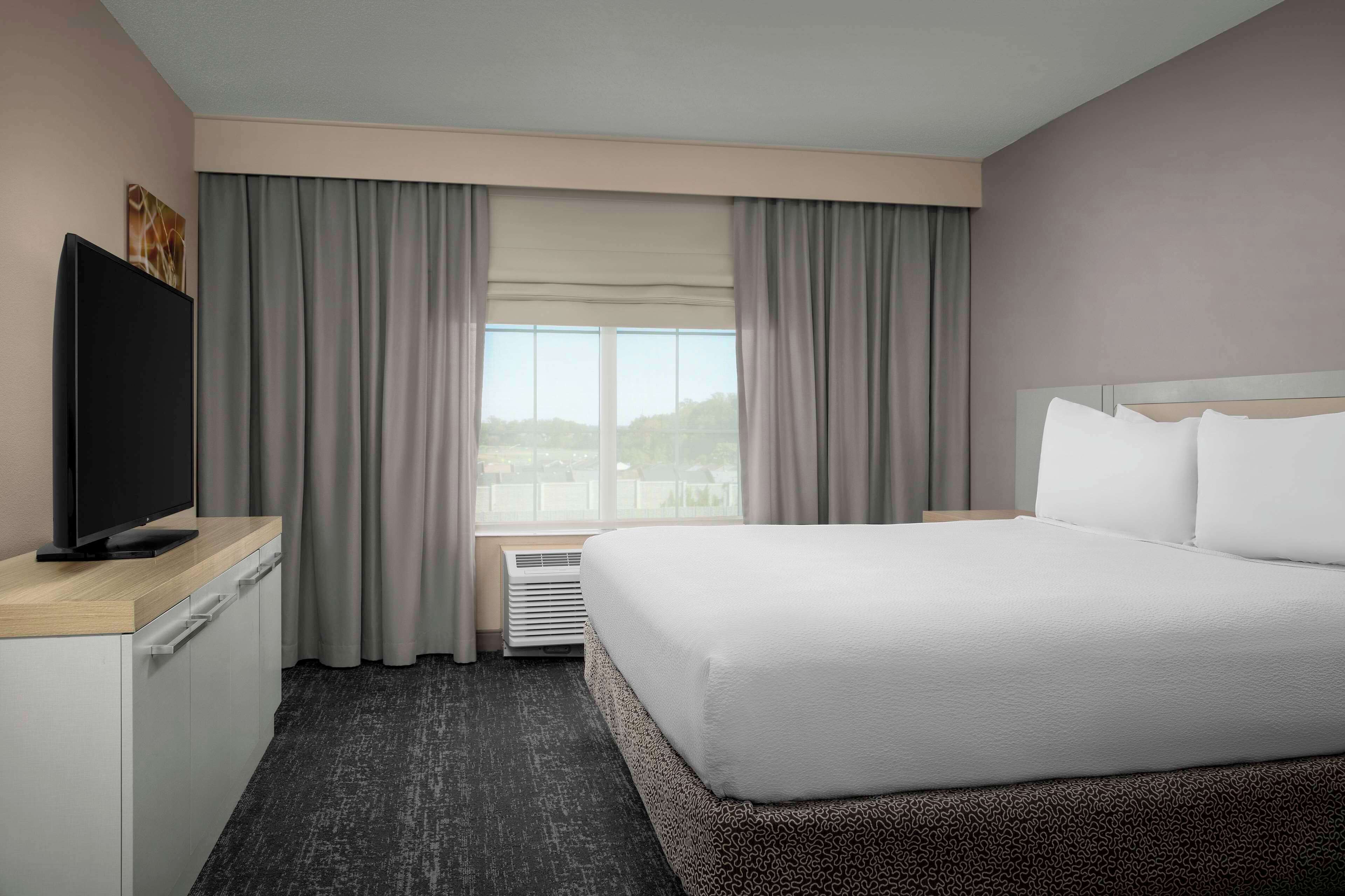 premium bedding, minibar, desk, laptop workspace