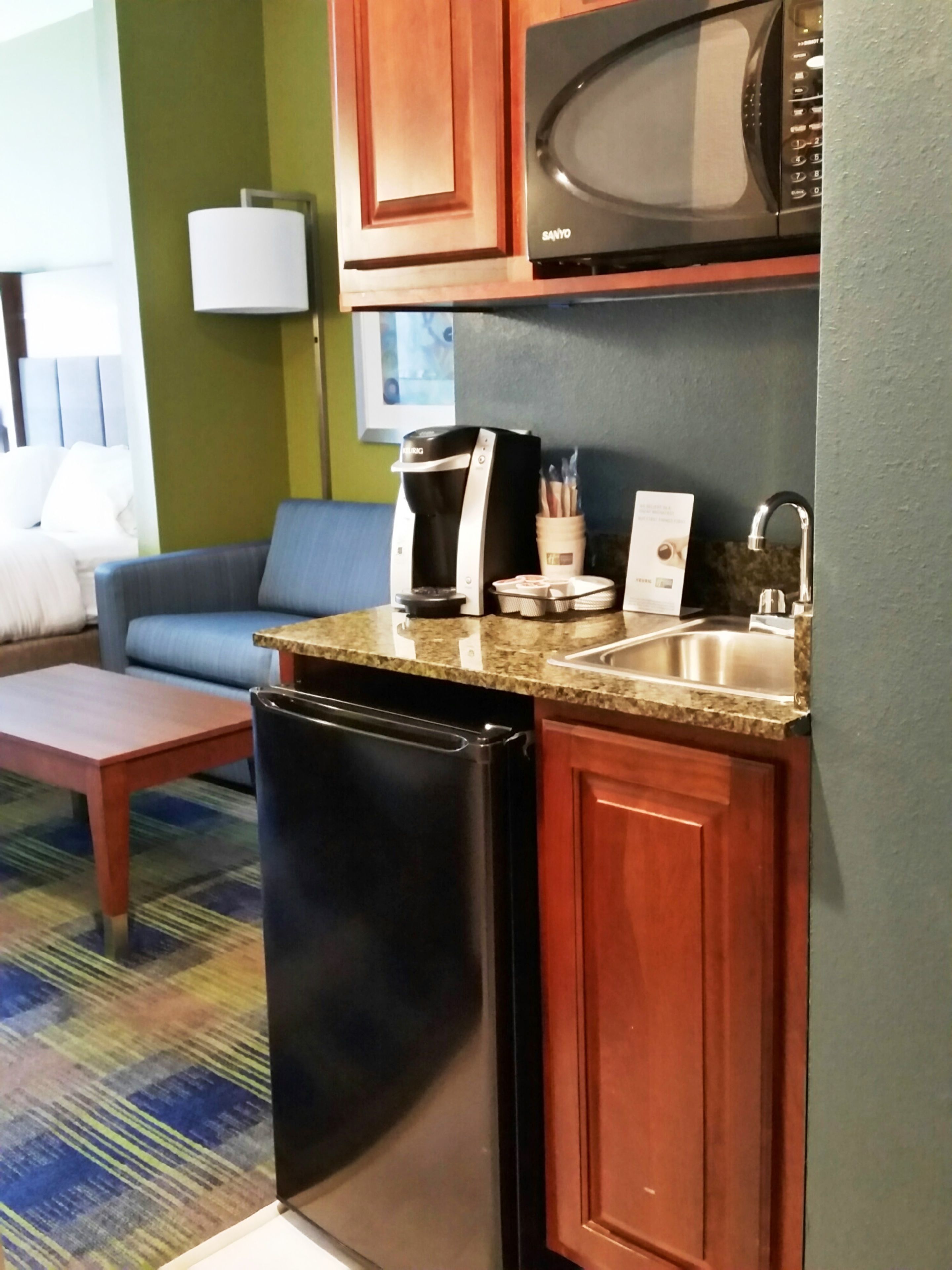 fridge, microwave, coffee/tea maker, cleaning supplies