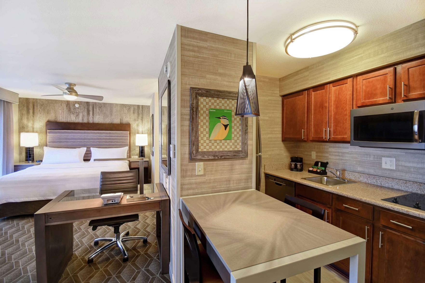 Premium bedding, down comforters, pillowtop beds, in-room safe