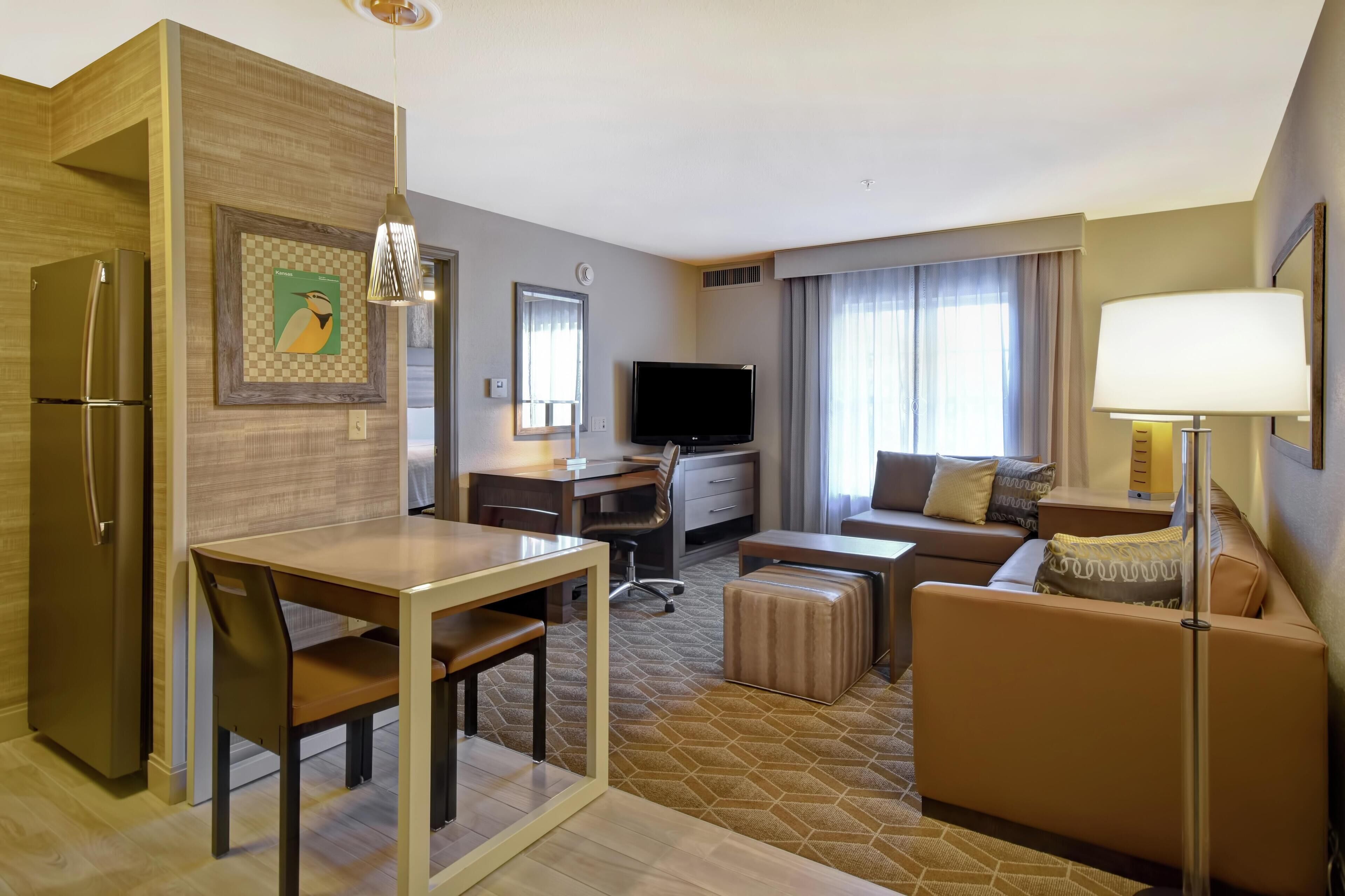 Premium bedding, down comforters, pillowtop beds, in-room safe