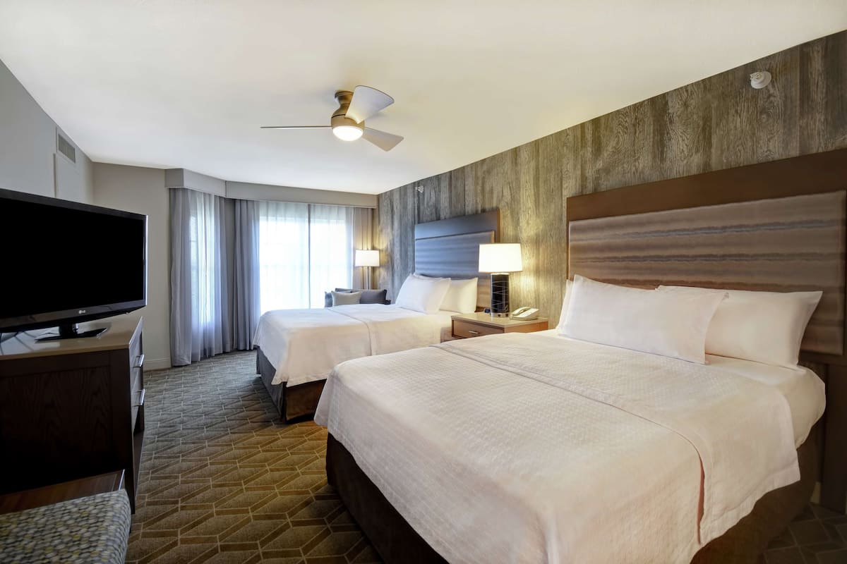 Premium bedding, down comforters, pillowtop beds, in-room safe