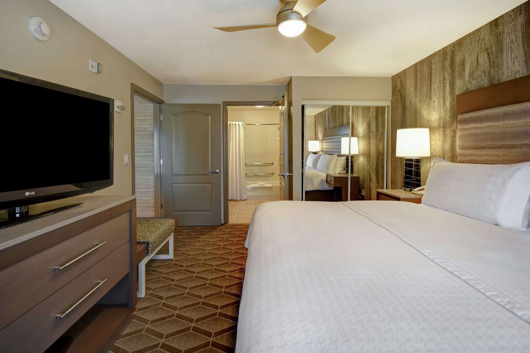 Premium bedding, down comforters, pillowtop beds, in-room safe