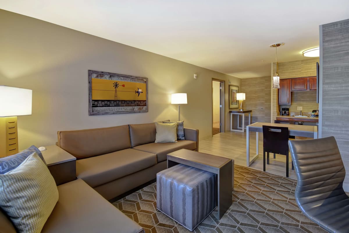 suite, 2 bedrooms, non smoking | living area | 42-inch lcd tv with cable channels, tv, video game console
