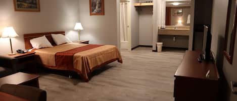 Standard Room, 1 Queen Bed | Desk, iron/ironing board, free WiFi, bed sheets