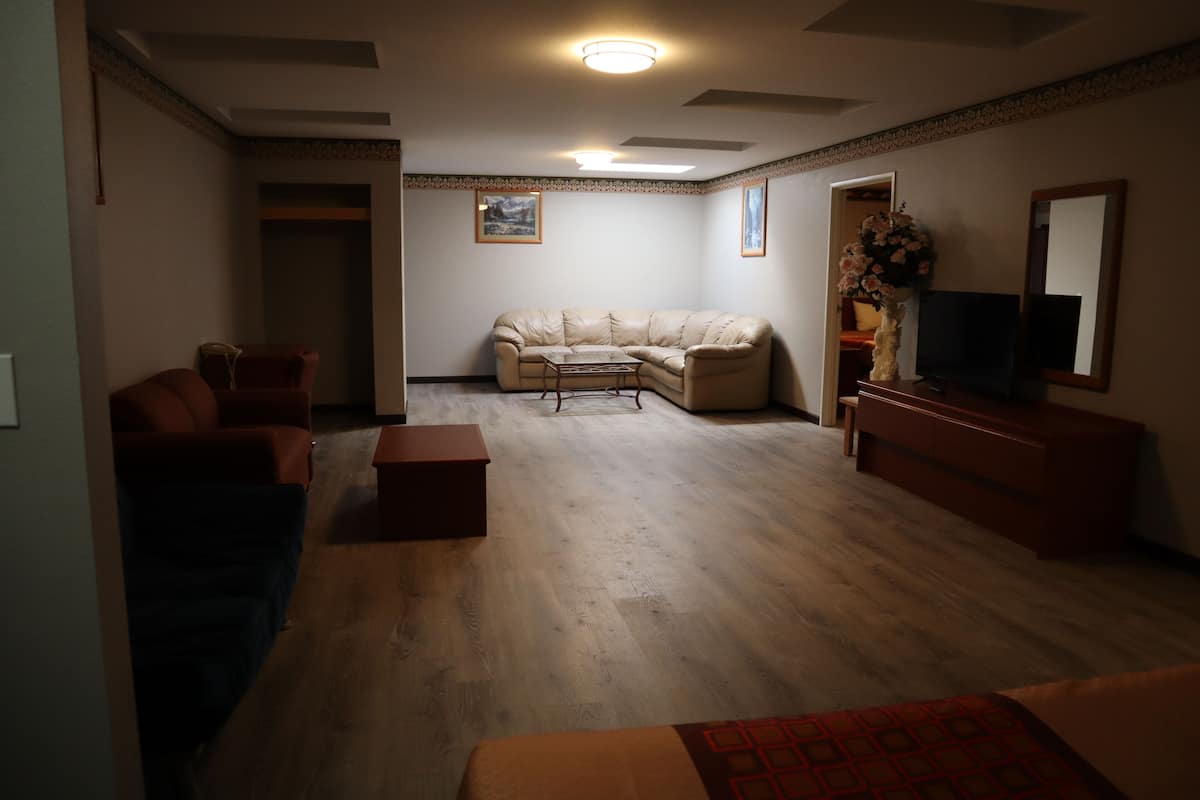 Standard Suite, 2 Bedrooms | Desk, iron/ironing board, WiFi (free), bed sheets