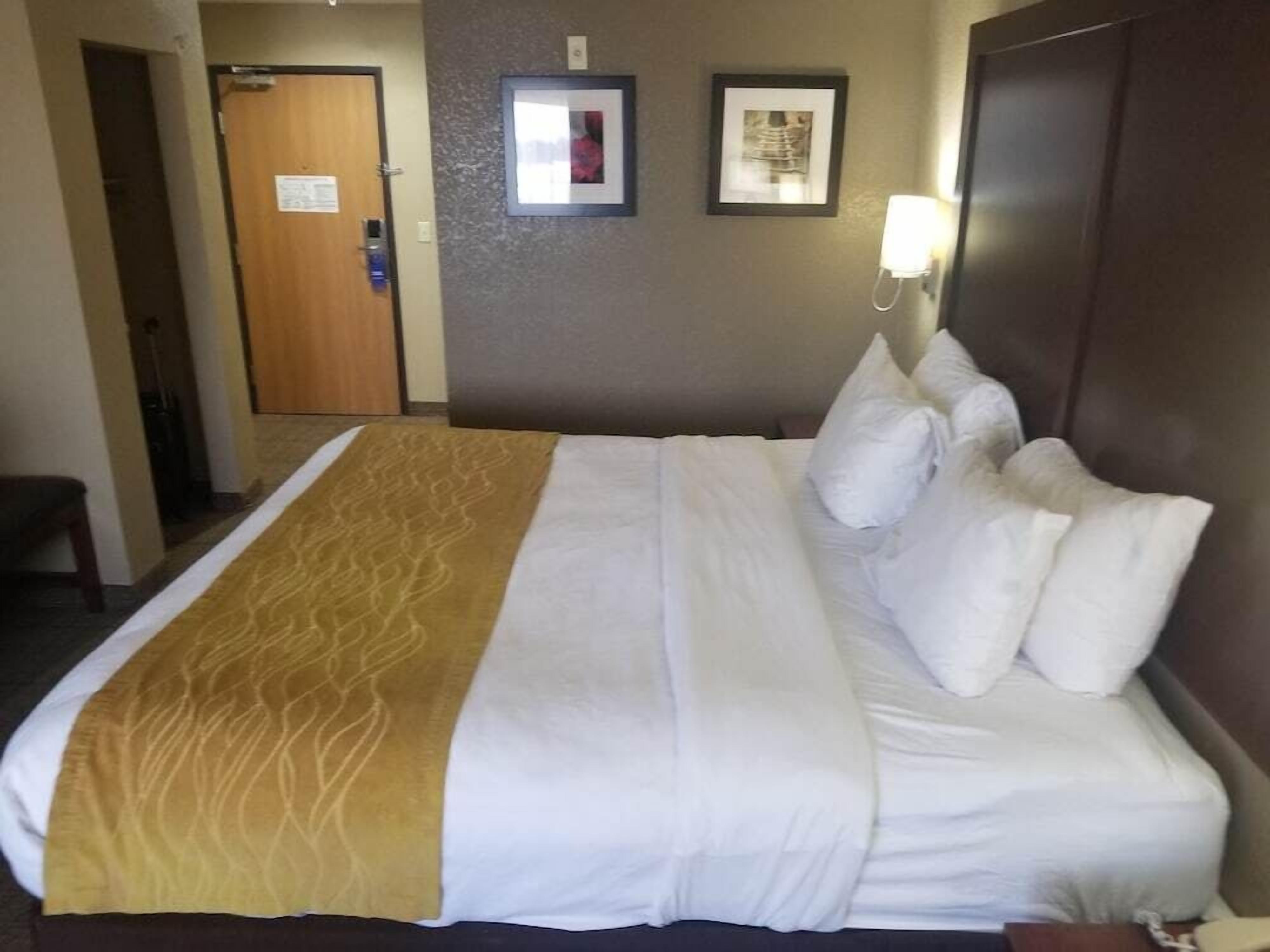Desk, blackout drapes, iron/ironing board, rollaway beds