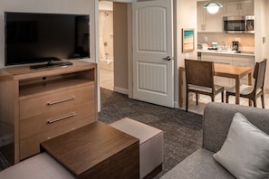 Suite, 1 Bedroom | Living area | 48-inch TV with cable channels, iPod dock, MP3 dock
