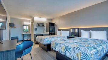 Desk, laptop workspace, blackout drapes, iron/ironing board