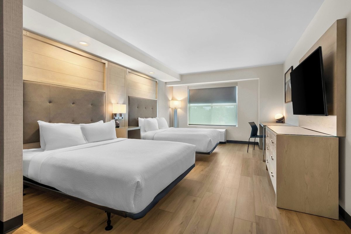 Suite, Multiple Beds | In-room safe, desk, laptop workspace, soundproofing