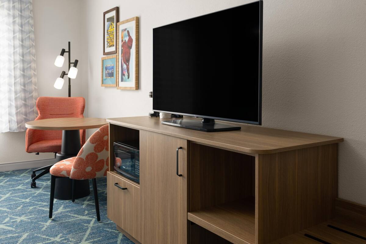 In-room safe, desk, iron/ironing board, cribs (free)