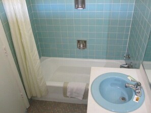 Room, 1 Queen Bed | Bathroom | Combined shower/tub, deep soaking tub, free toiletries, hair dryer