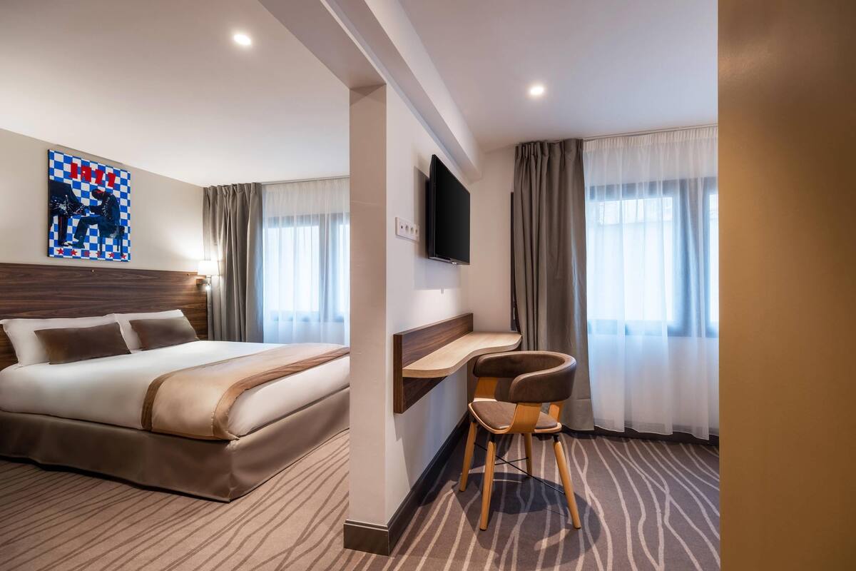 Ropa de cama de alta calidad, minibar, caja fuerte