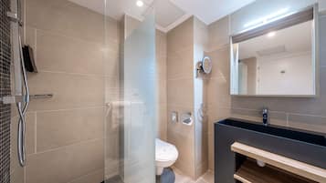 Luxe beddengoed, een minibar, een kluis op de kamer, geluiddichte muren
