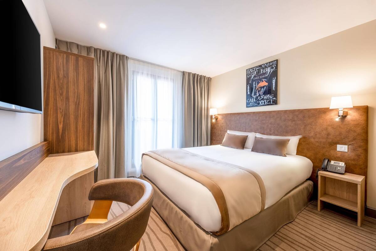 Ropa de cama de alta calidad, minibar, caja fuerte