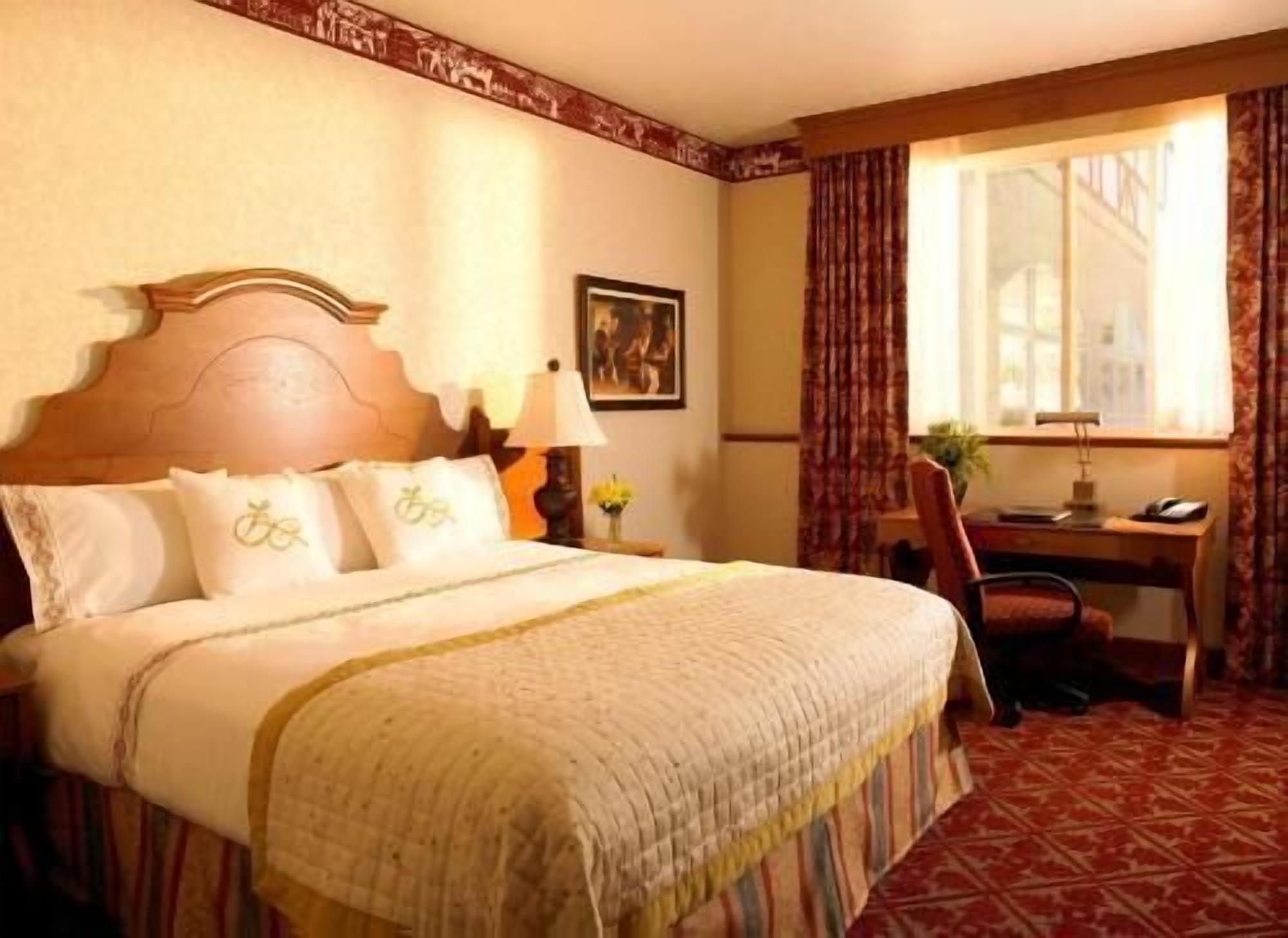 Premium bedding, down duvets, pillow-top beds, in-room safe