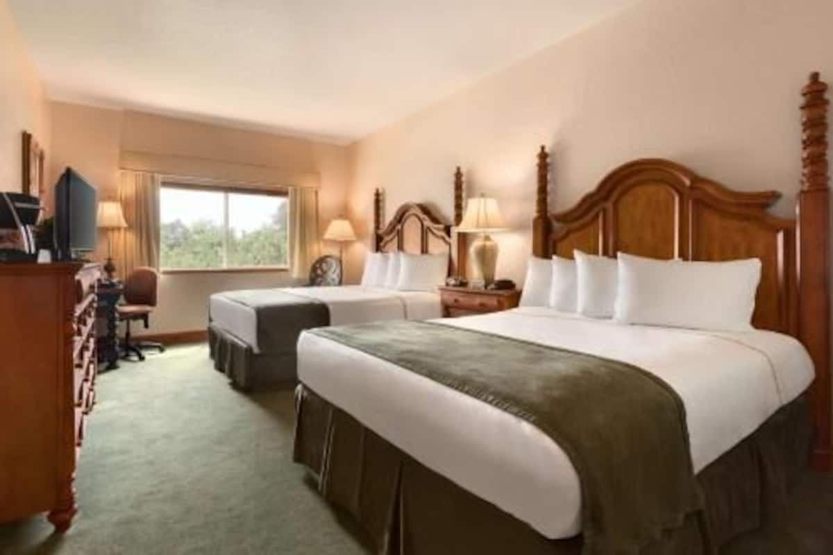 Premium bedding, down duvets, pillow-top beds, in-room safe