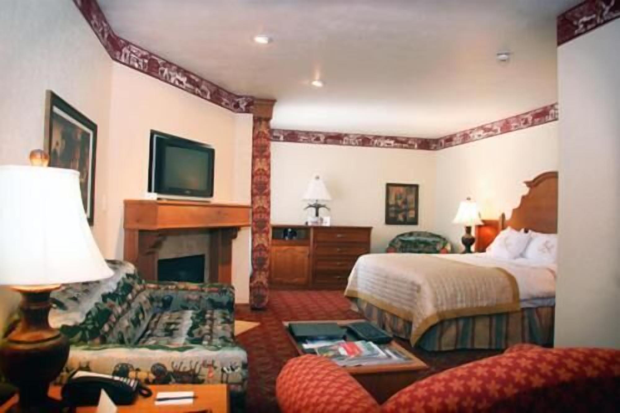 Premium bedding, down duvets, pillow-top beds, in-room safe