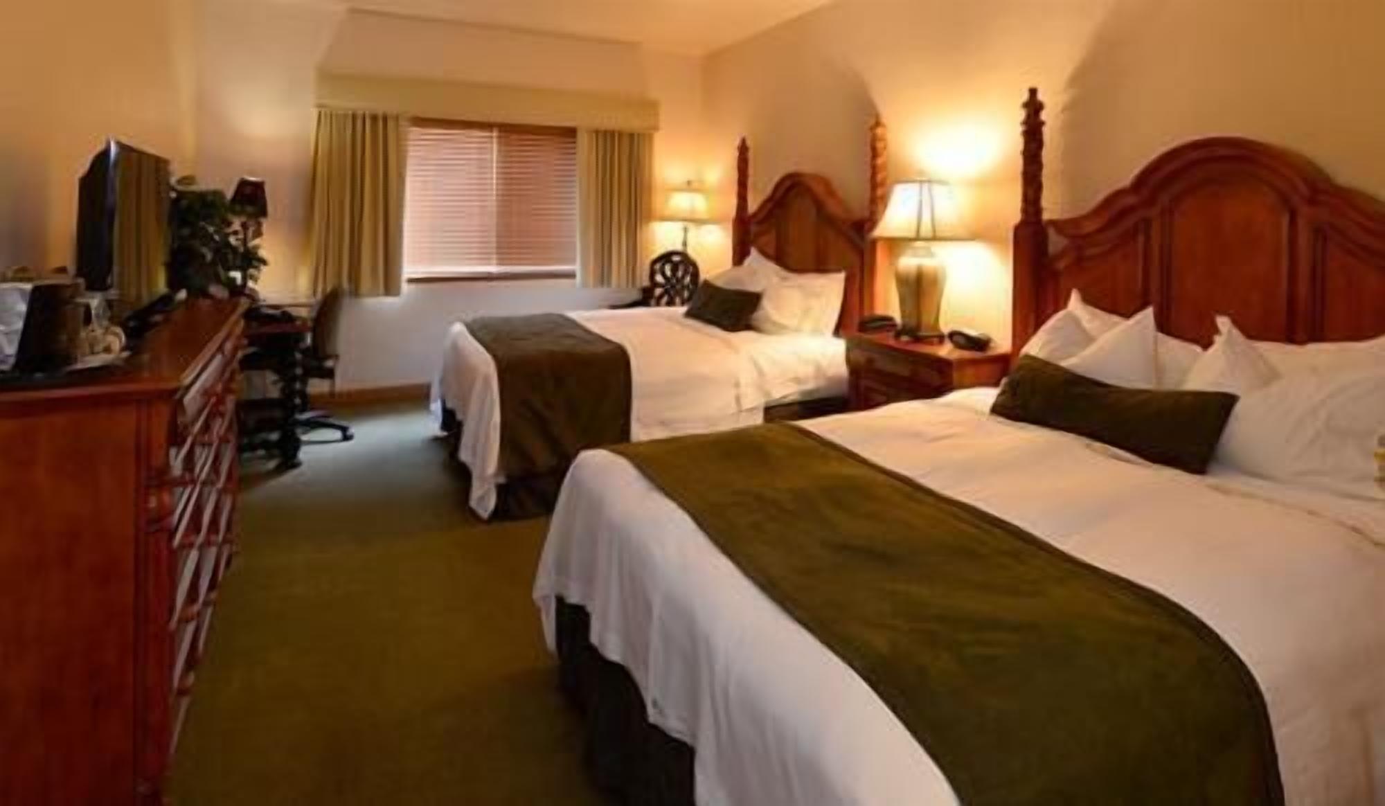 Premium bedding, down duvets, pillow-top beds, in-room safe