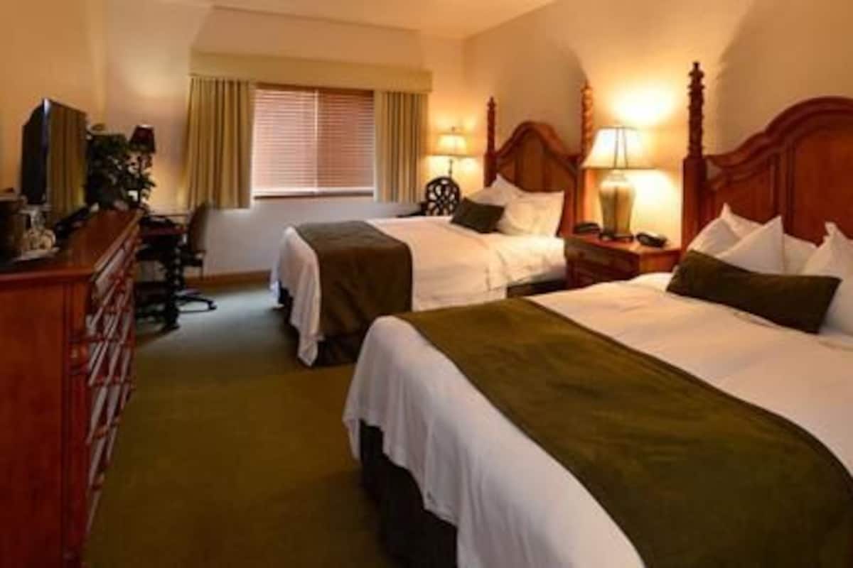 Premium bedding, down duvets, pillow-top beds, in-room safe