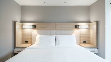 Premium bedding, down comforters, Select Comfort beds, in-room safe
