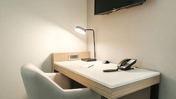 Premium bedding, down duvets, Select Comfort beds, in-room safe