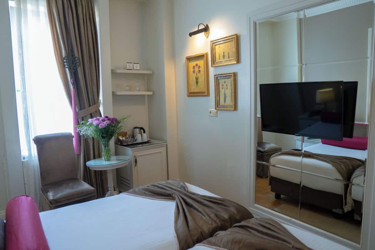 1 quarto, roupas de cama premium, frigobar, cofres nos quartos