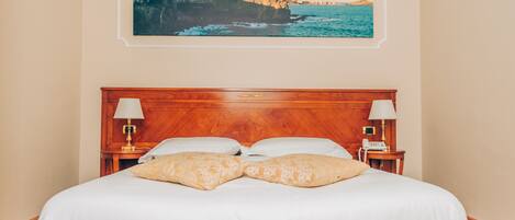 Hypo-allergenic bedding, minibar, in-room safe, desk