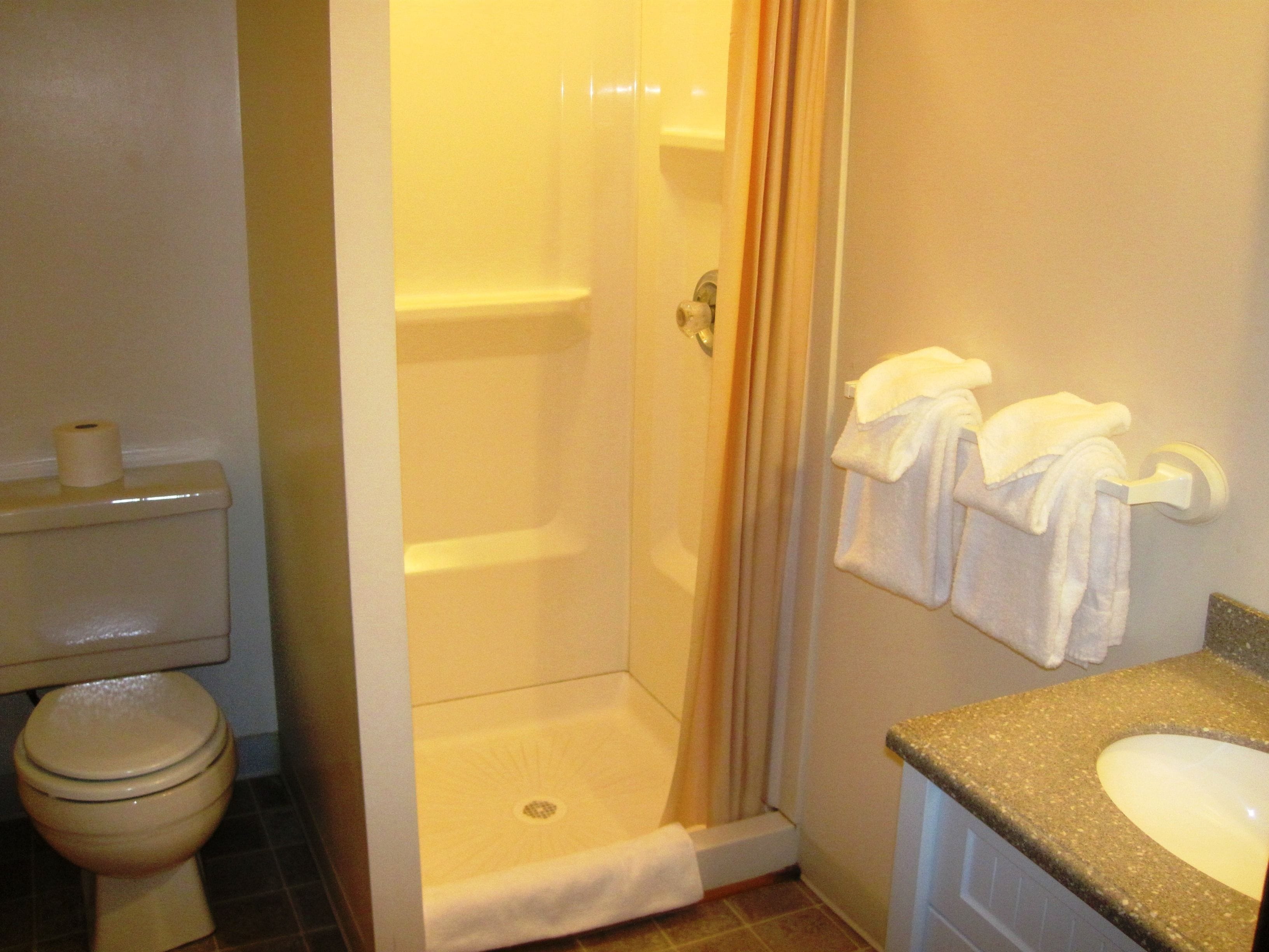 shower, free toiletries, towels, soap