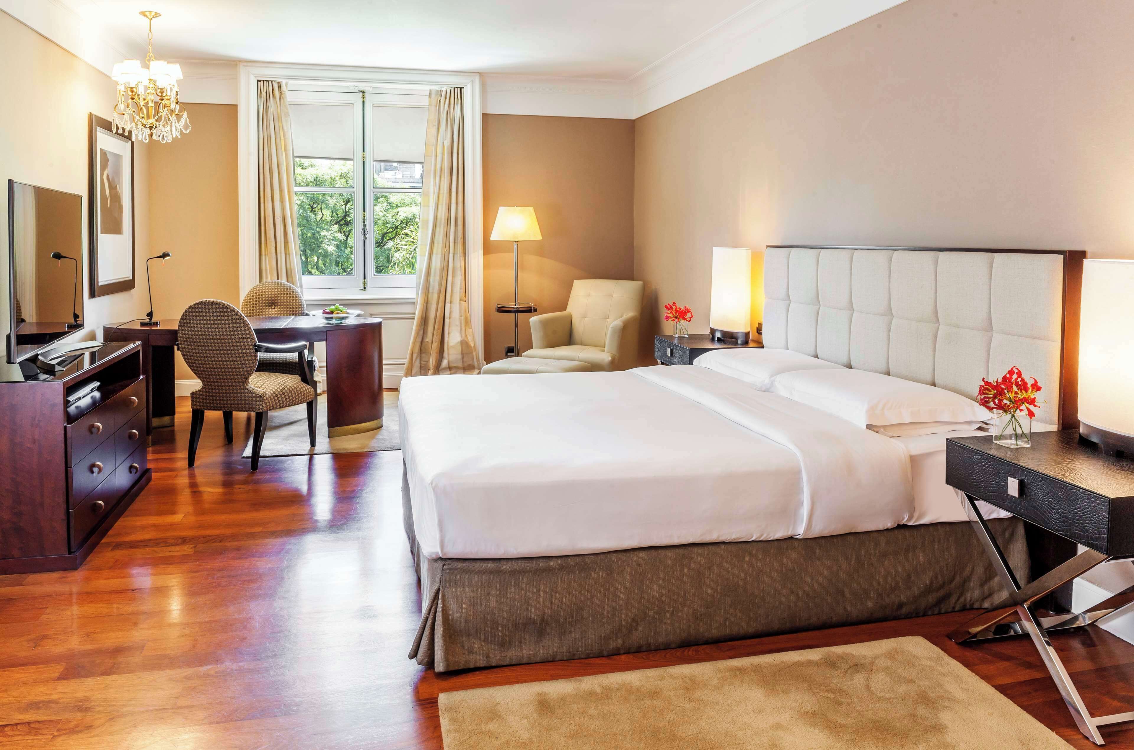 Premium bedding, down comforters, minibar, in-room safe