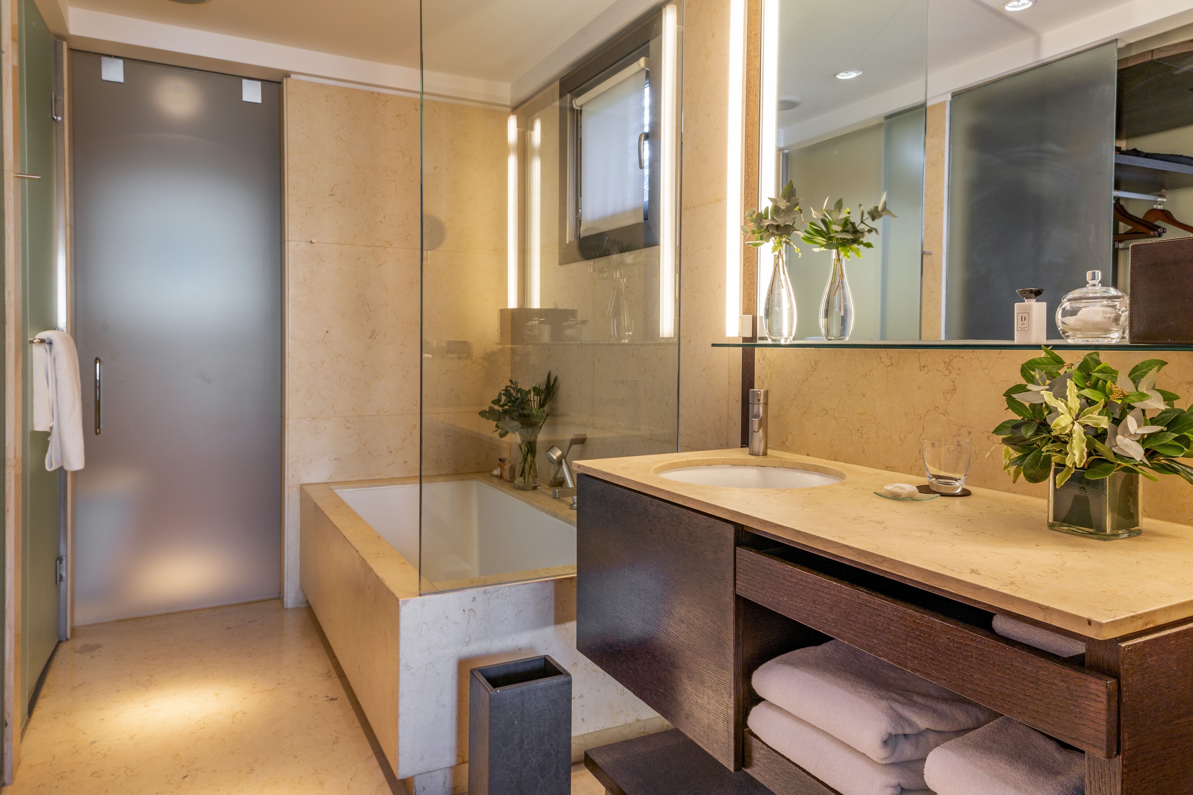 Deluxe Room, 1 King Bed, Garden View | Bathroom | Separate bathtub and shower, rainfall showerhead, designer toiletries