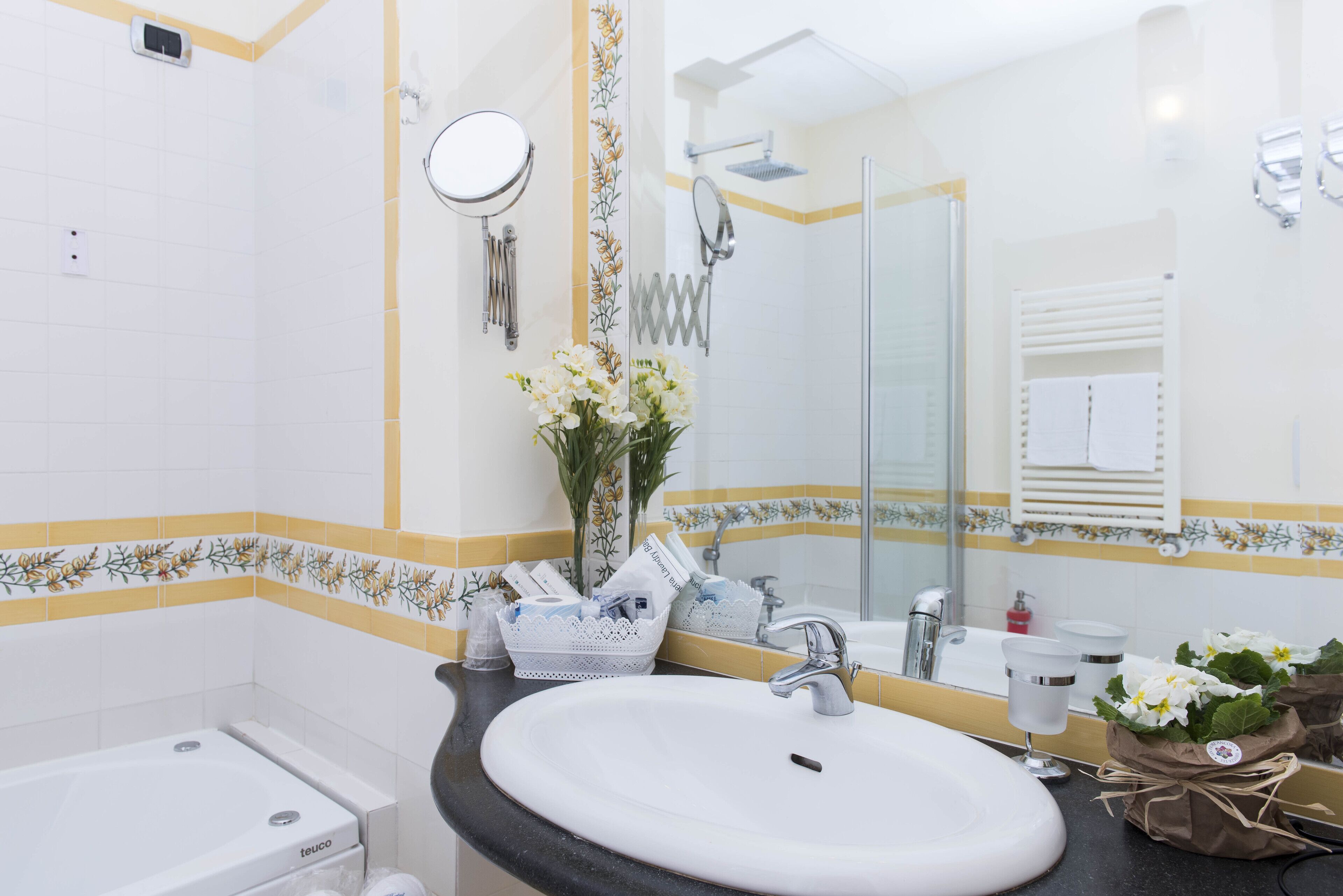 jetted bath, rainfall showerhead, free toiletries, hair dryer