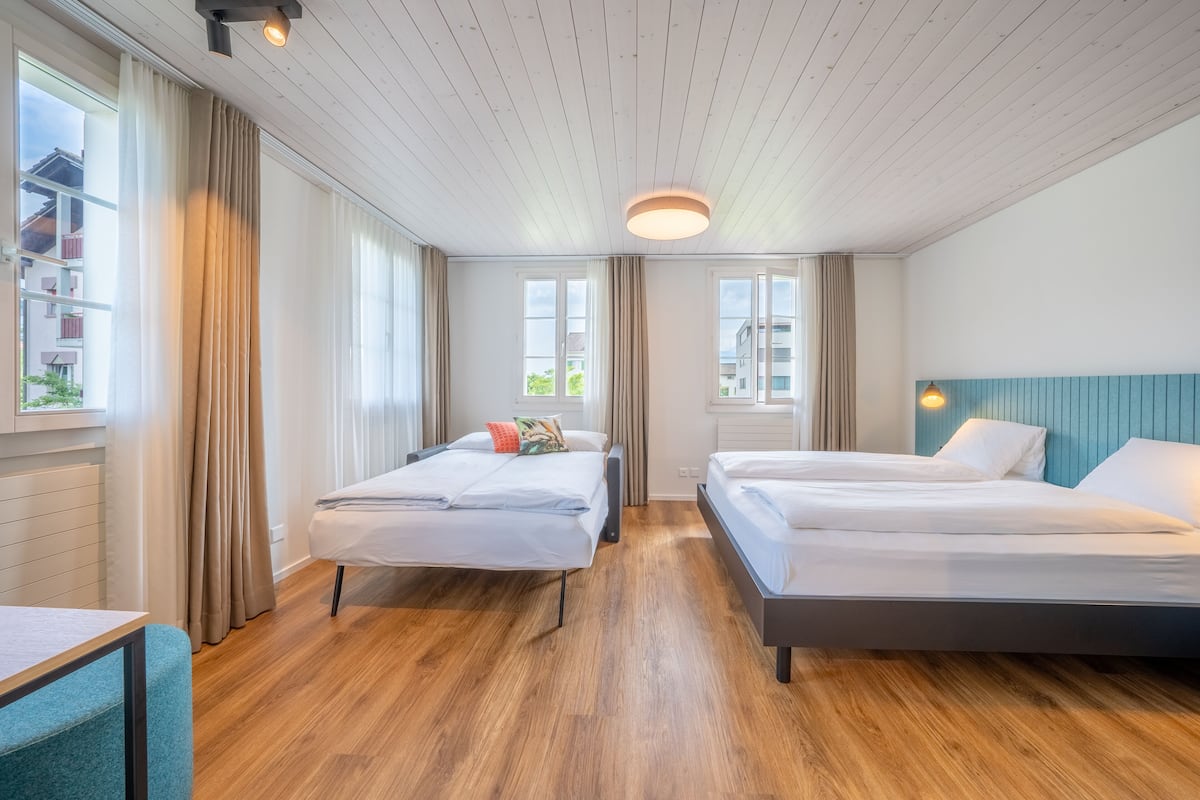 Triple Room (inkl. Ticket für den ÖPNV) | Garden view