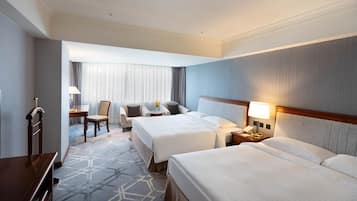 Deluxe Family Room, 2 Queen Beds | Hypo-allergenic bedding, down comforters, minibar, in-room safe
