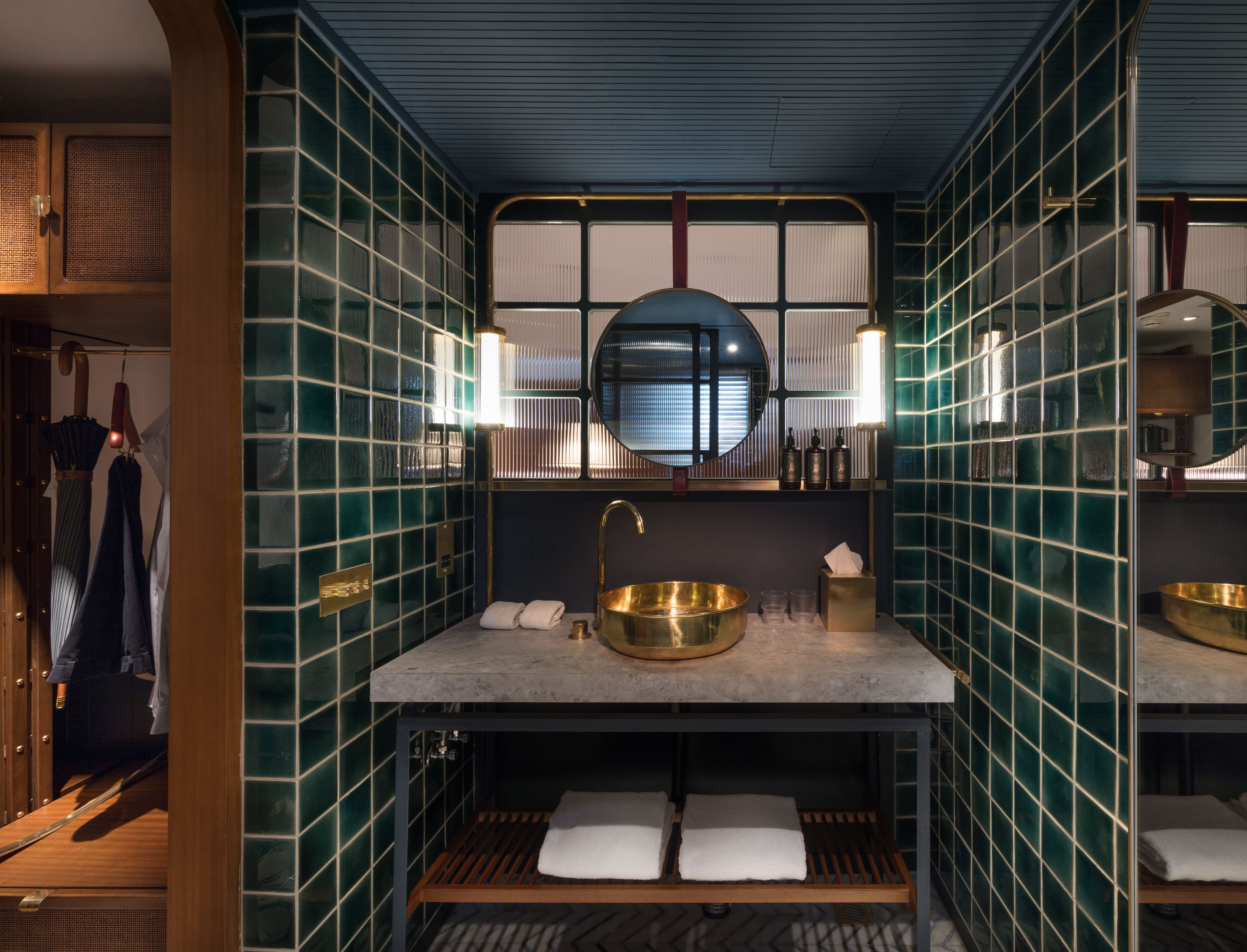 extra large king room | bathroom | shower, rainfall showerhead, hair dryer, bathrobes