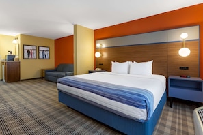 Studio Suite, 1 King Bed, Non Smoking | Desk, blackout drapes, iron/ironing board, free cribs/infant beds - AmericInn by Wyndham Fulton Clinton (Fulton)