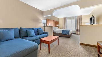Suite estándar, 1 cama de matrimonio grande, no fumadores | Edredones de plumas, escritorio, cortinas opacas