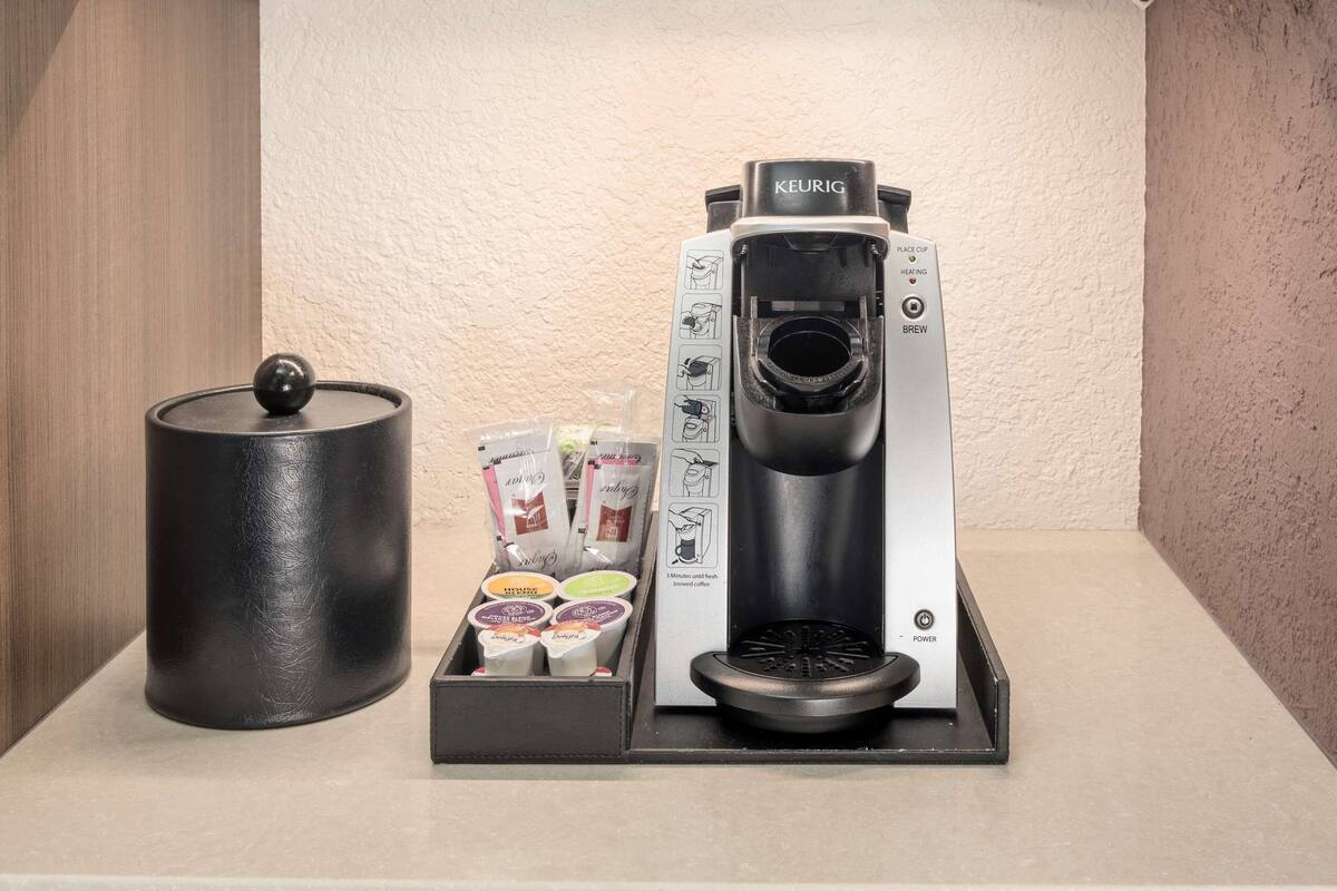 desk, blackout curtains, iron/ironing board, free cots/infant beds