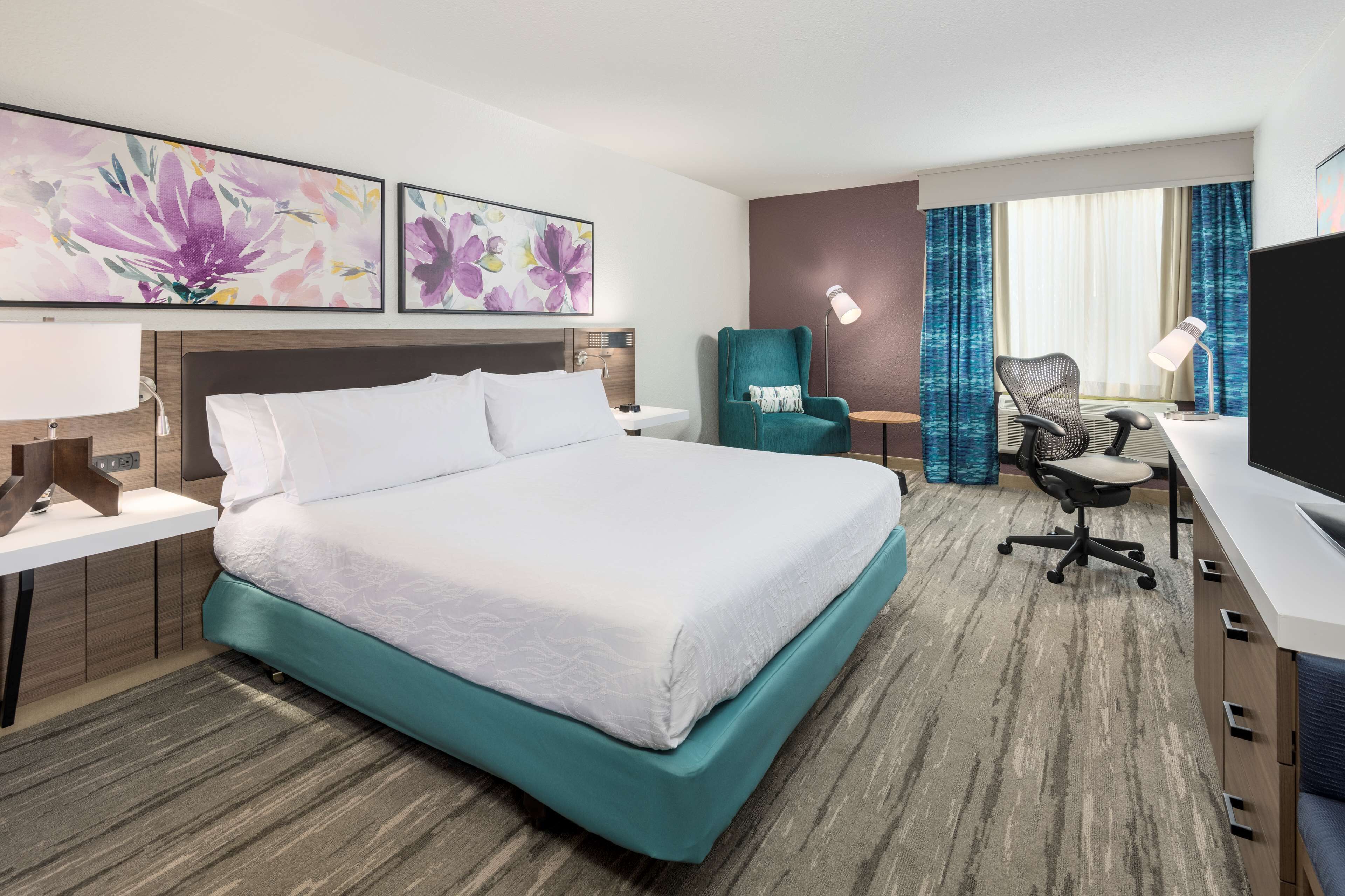 desk, blackout curtains, iron/ironing board, free cots/infant beds