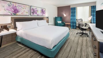 Desk, blackout drapes, iron/ironing board, free cribs/infant beds