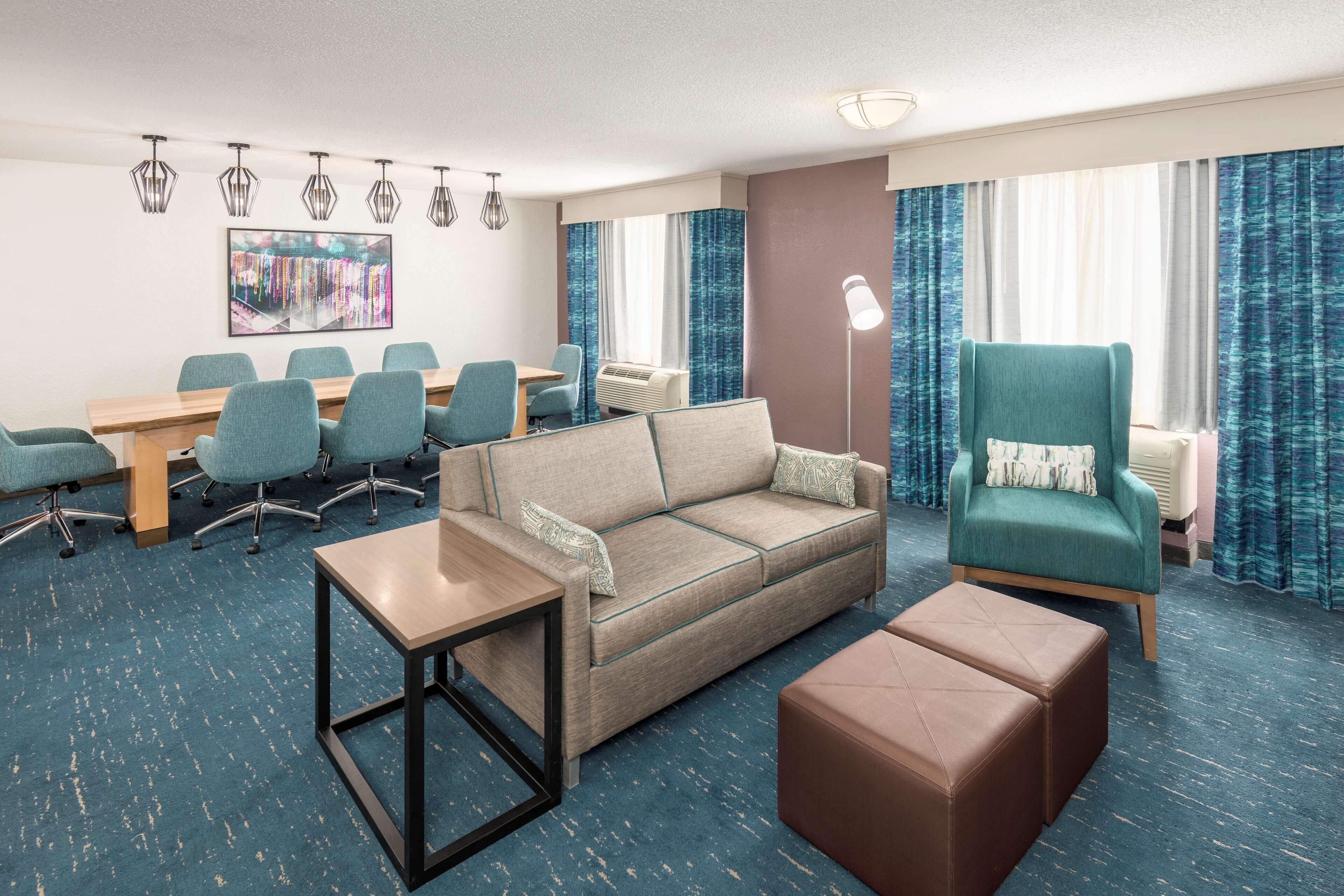 one-bedroom king suite non smoking | living area | 49-inch lcd tv with cable channels, tv, mp3 dock