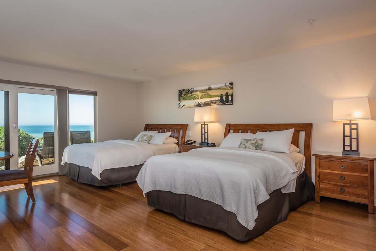 Deluxe Room, 2 Queen Beds, Patio, Ocean View | Iron/ironing board, free WiFi, bed sheets, alarm clocks