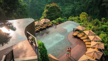 Outdoor pool, pool umbrellas, pool loungers