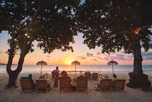 On the beach, white sand, free beach cabanas, sun loungers